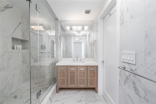 10 Venetian Way Unit 1903, Miami Beach, FL 33139 - full bathroom with a marble finish shower, marble finish flooring, and vanity