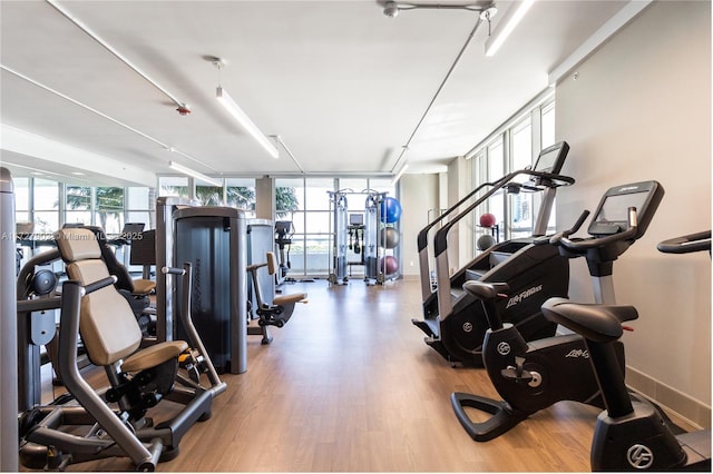 10 Venetian Way Unit 1903, Miami Beach, FL 33139 - gym with wood finished floors and expansive windows