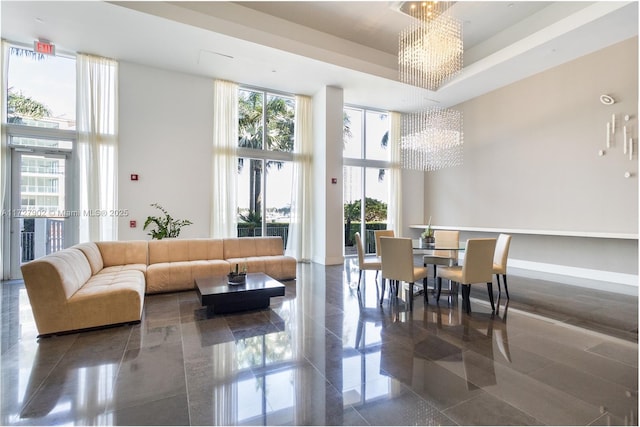 10 Venetian Way Unit 1903, Miami Beach, FL 33139 - community lobby with a high ceiling and a wall of windows