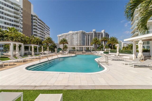 10 Venetian Way Unit 1903, Miami Beach, FL 33139 - community pool featuring a patio