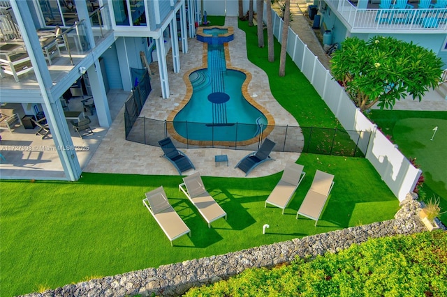 view of pool featuring a patio