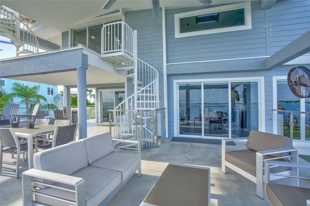 view of patio featuring a balcony and outdoor lounge area