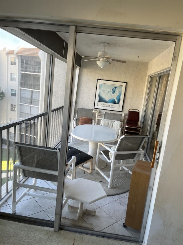 dining space featuring ceiling fan