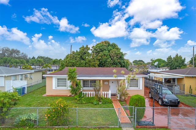 ranch-style home with a front yard