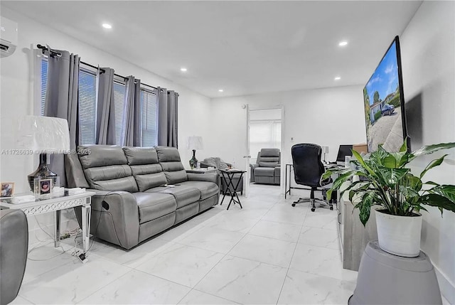 living room featuring a wall mounted AC