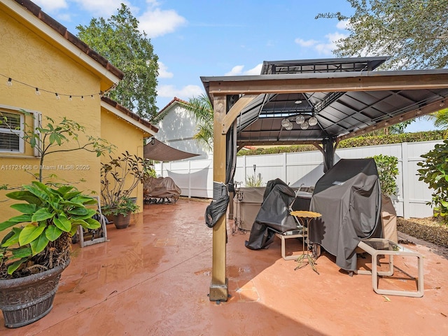 view of patio / terrace with a gazebo and area for grilling