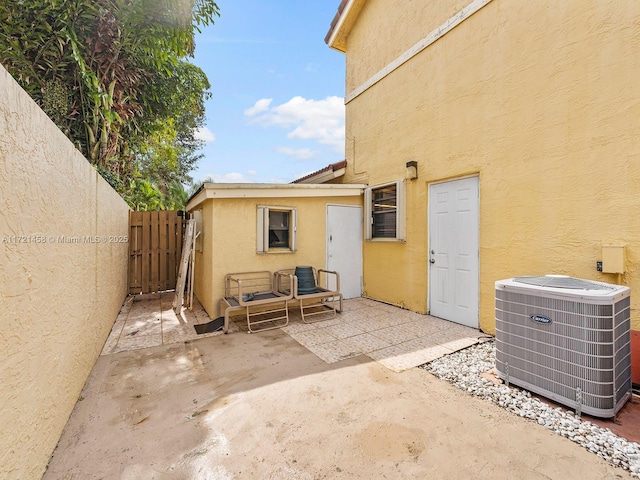 view of patio with central AC unit