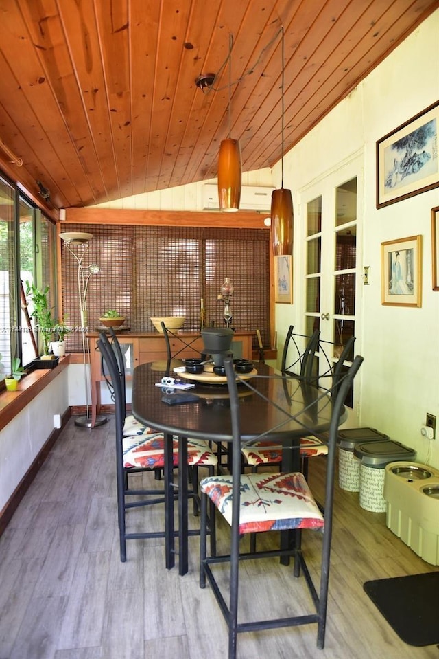 interior space featuring wood ceiling, wood-type flooring, and french doors