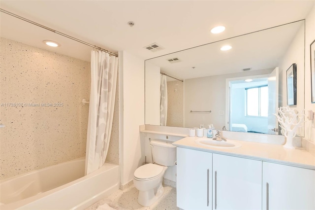 full bathroom with toilet, vanity, and shower / bath combo