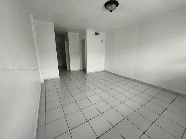 view of tiled empty room