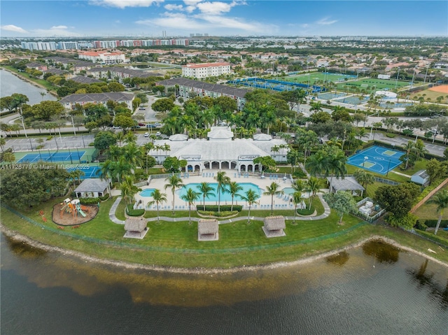 birds eye view of property with a water view