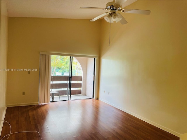 unfurnished room with ceiling fan and hardwood / wood-style flooring