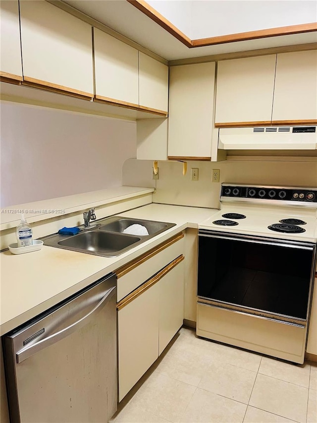 kitchen featuring stainless steel dishwasher, white electric range, sink, and light tile patterned flooring