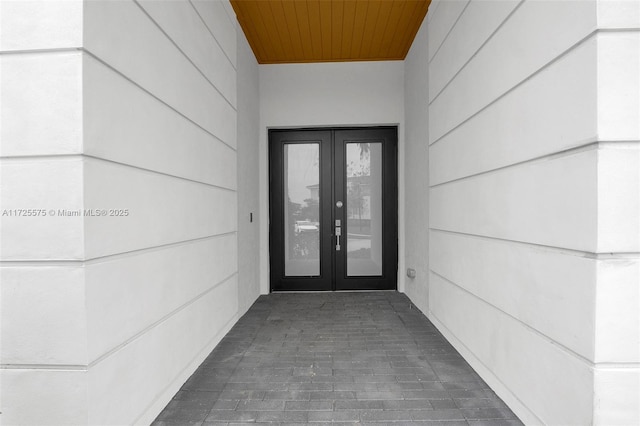 property entrance featuring french doors