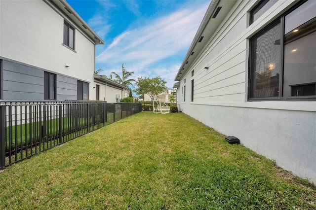 view of yard with a fenced backyard