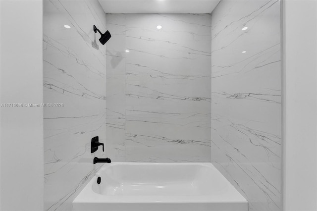 bathroom featuring bathing tub / shower combination