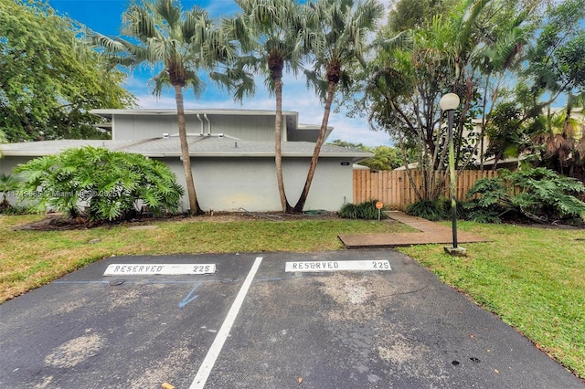 exterior space featuring a front lawn