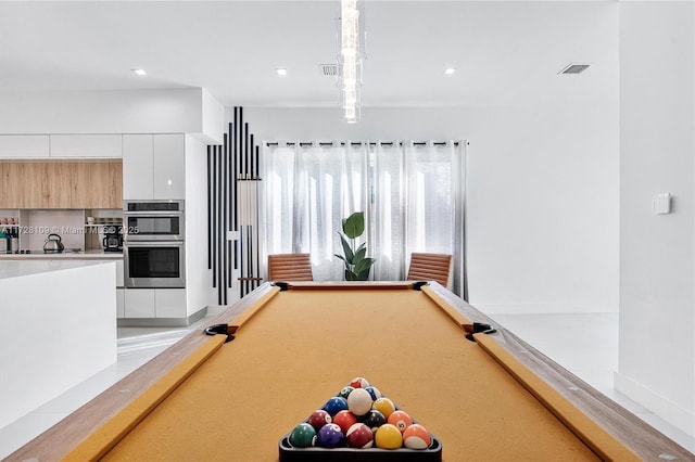 playroom with billiards