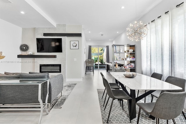 dining space featuring a notable chandelier