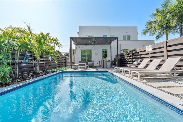 view of pool featuring a patio area