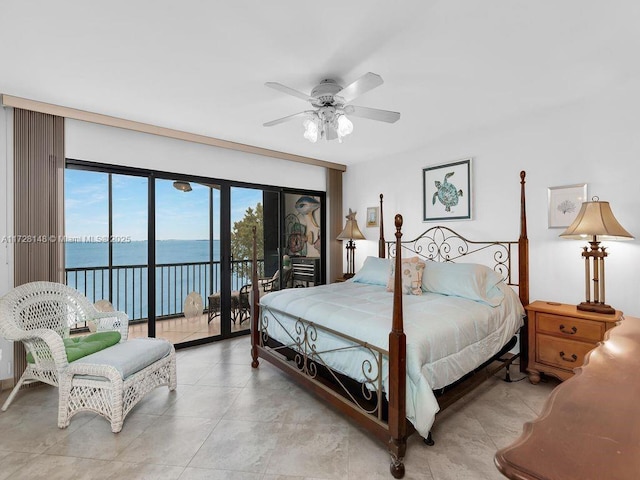 bedroom with a water view, ceiling fan, and access to outside