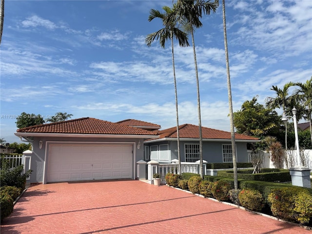 view of front of home with a garage