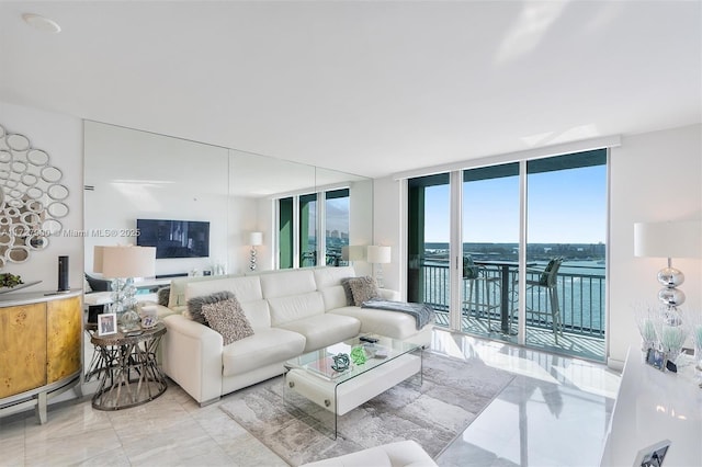 living room with floor to ceiling windows