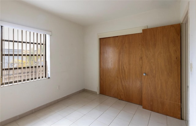 unfurnished bedroom featuring a closet