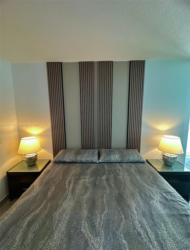 unfurnished bedroom with a textured ceiling