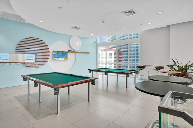 rec room featuring billiards, floor to ceiling windows, visible vents, and tile patterned floors