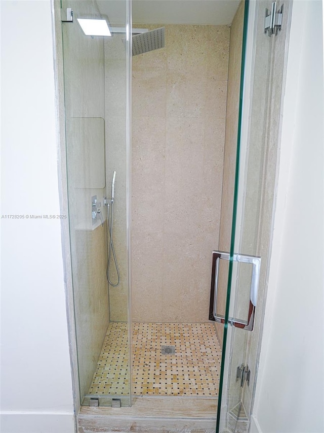 bathroom featuring walk in shower