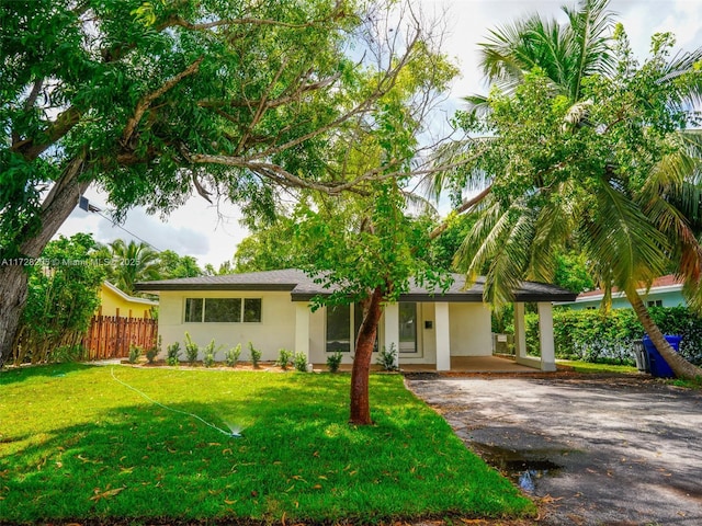 view of front of home with a front lawn