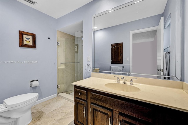 bathroom featuring toilet, vanity, and walk in shower