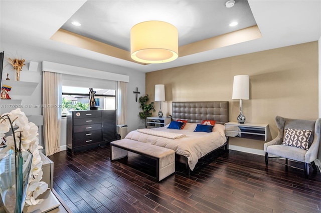 bedroom with a raised ceiling