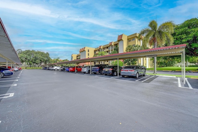 view of parking with a carport