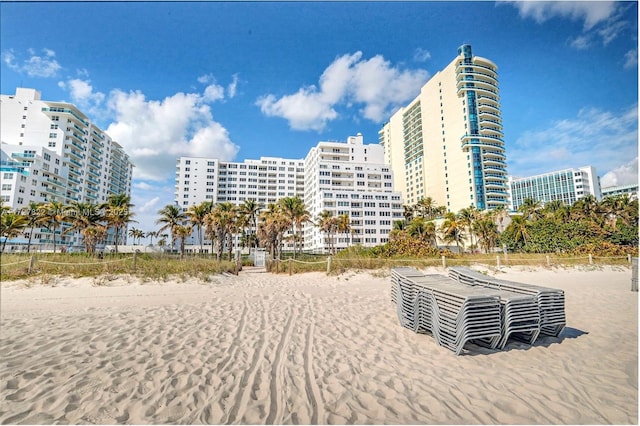 exterior space featuring a city view and a water view