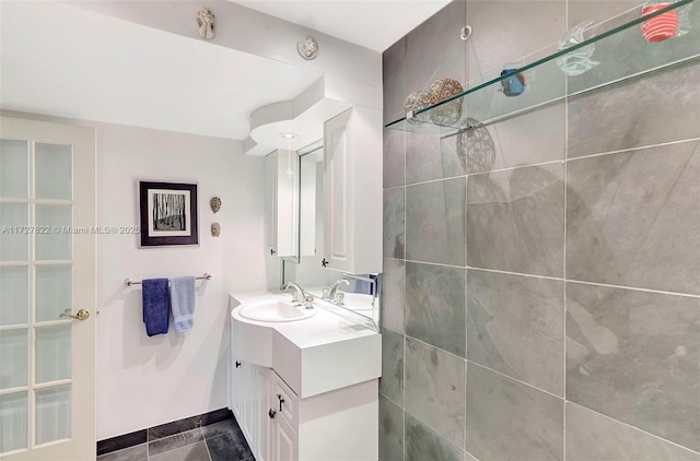 bathroom featuring vanity and baseboards