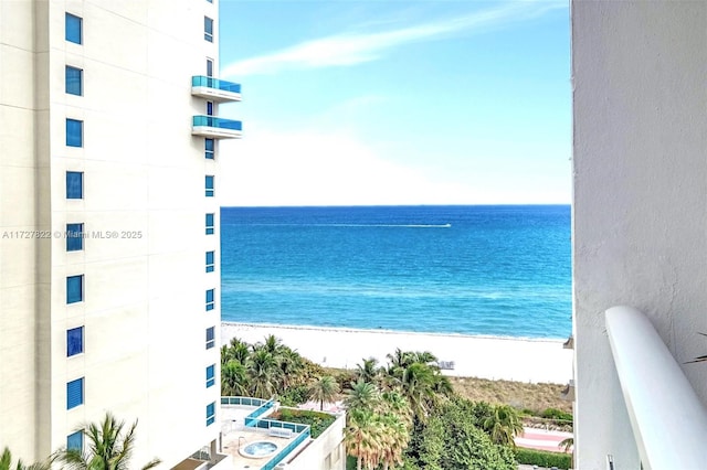 view of water feature with a beach view