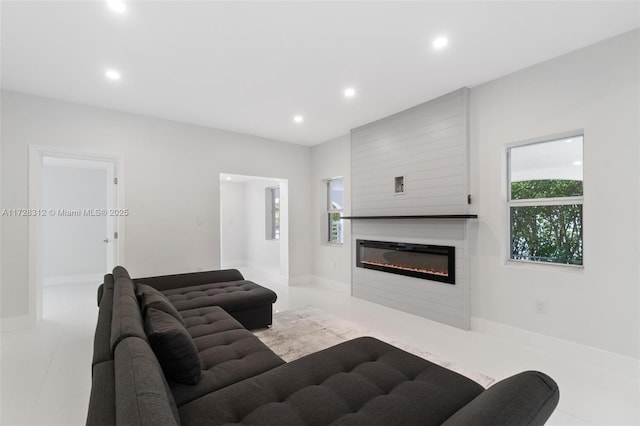 living room with light tile patterned flooring