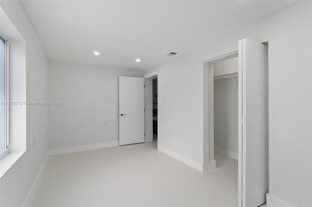 unfurnished bedroom featuring a closet