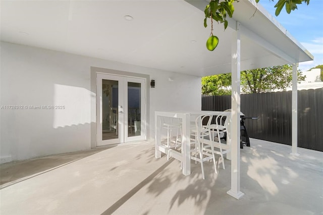 view of patio featuring french doors