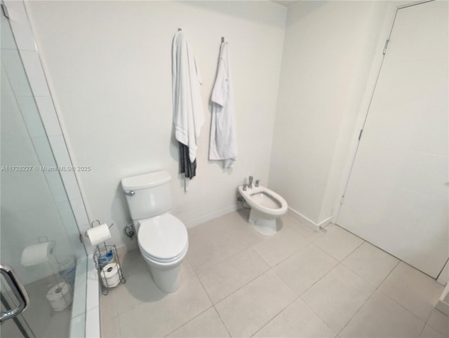 full bathroom with a bidet, baseboards, a stall shower, tile patterned floors, and toilet