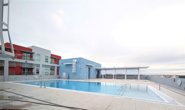 view of pool featuring a patio