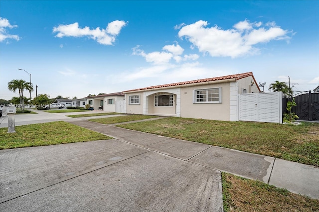 view of front of home with a front lawn