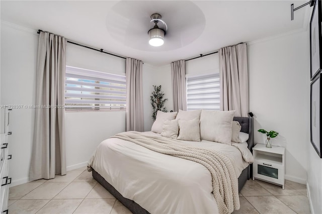 tiled bedroom with ceiling fan