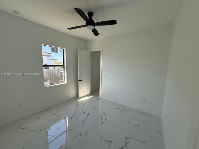 spare room featuring ceiling fan