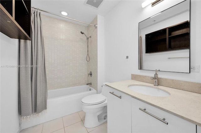 full bathroom with toilet, vanity, tile patterned floors, and shower / bathtub combination with curtain