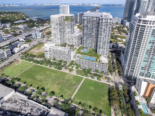 birds eye view of property featuring a water view