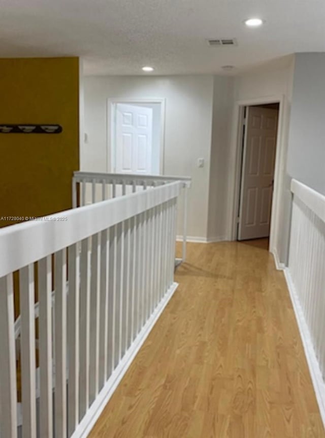 hall featuring light wood-type flooring