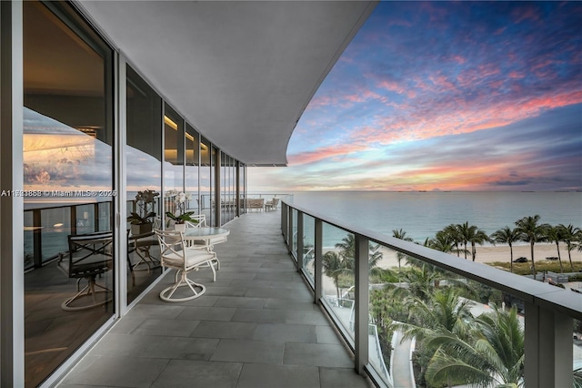 balcony at dusk with a water view